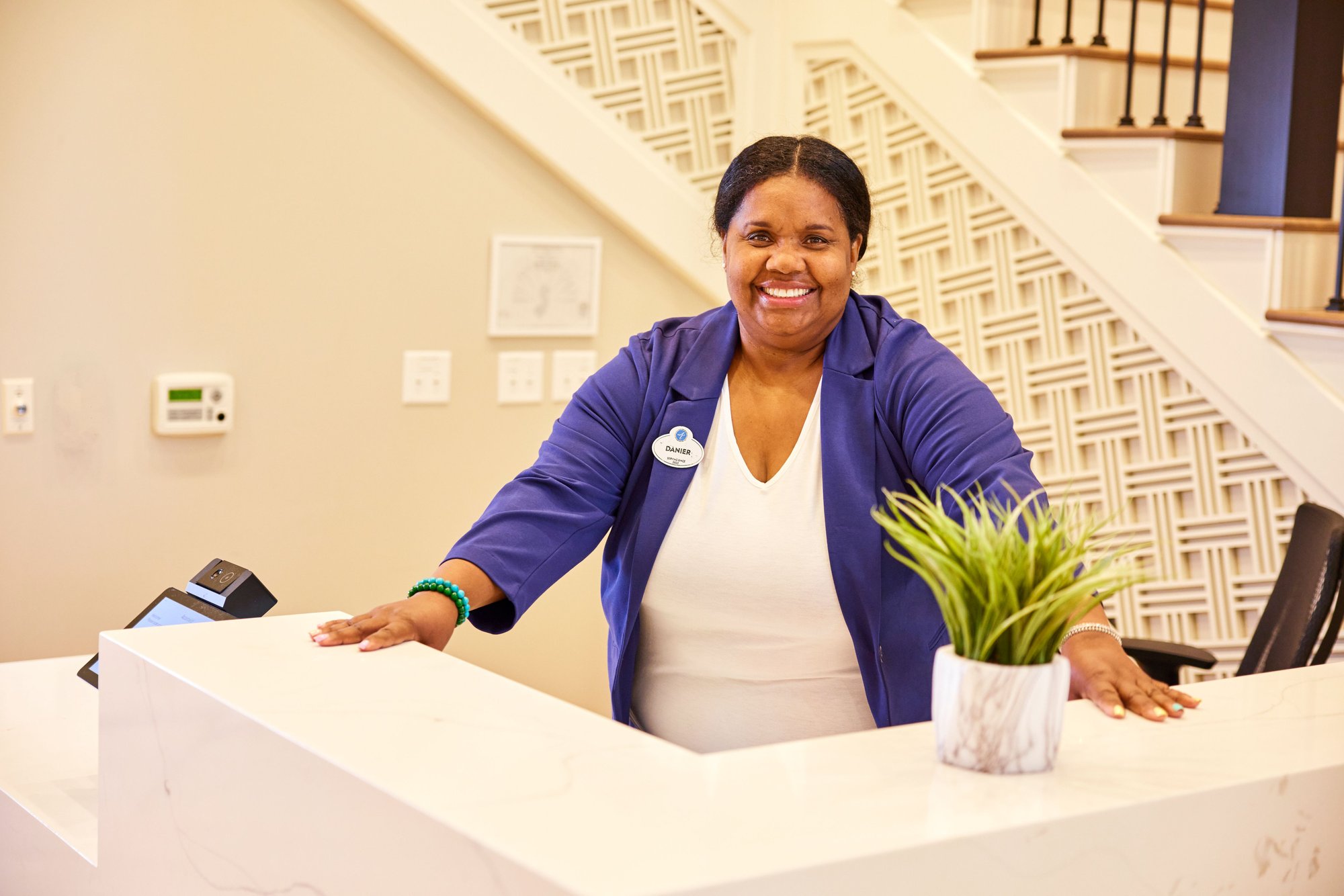arbor terrace staff at lobby desk