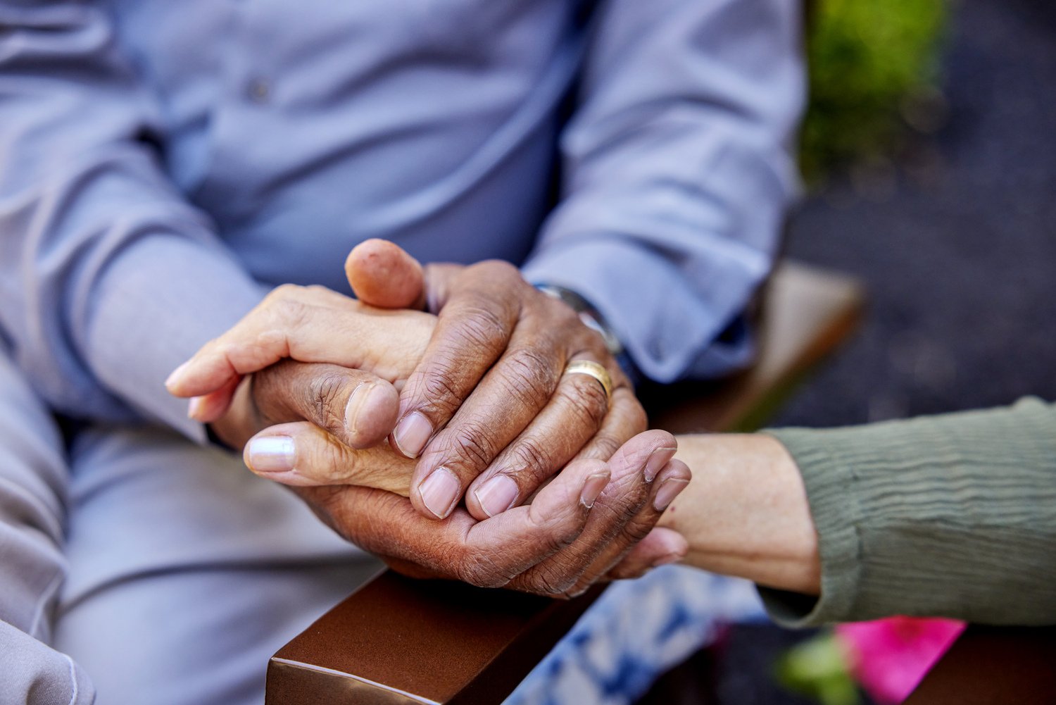 arbor terrace residents holding hands